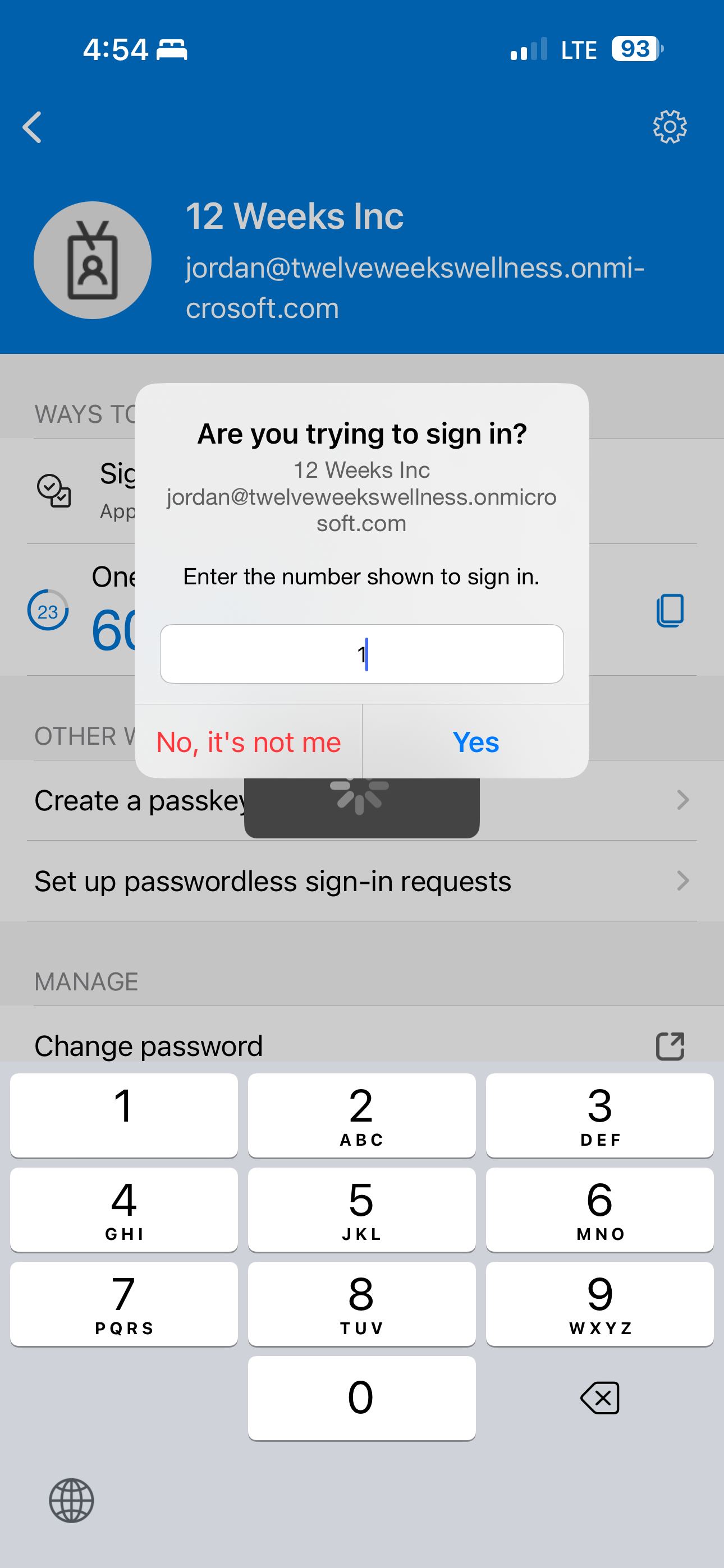 Phone showing the sign-in approval prompt — enter the number shown on your computer